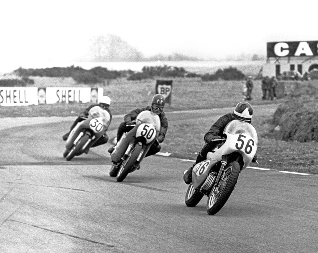 Percy Tait leads John Cooper.